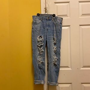 Low-rise light-wash distressed boyfriend denim jeans